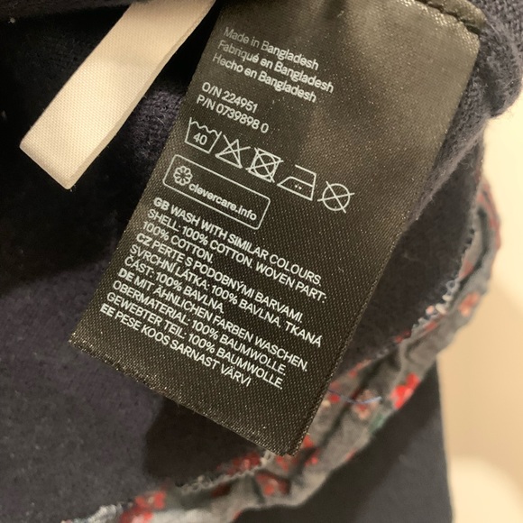 H&M blue sweater with built in collar and bottom floral detail. Size 4-6. - Picture 4 of 4